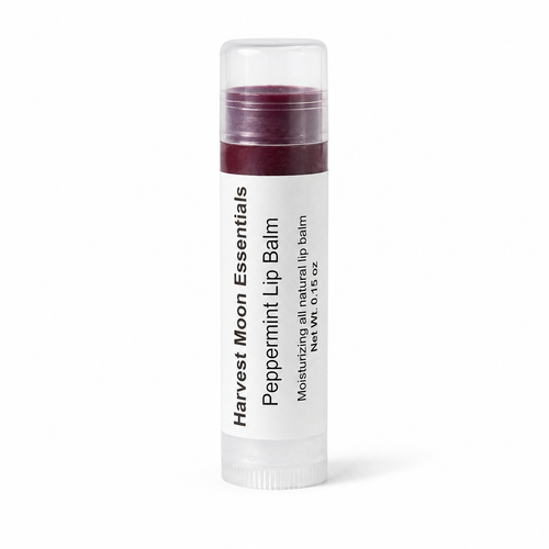 Harvest Moon Essentials peppermint lip balm on a white background